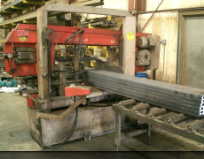 band saw cutting at amm mfg